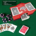 Card shuffler with playing cards and poker chips on a green surface